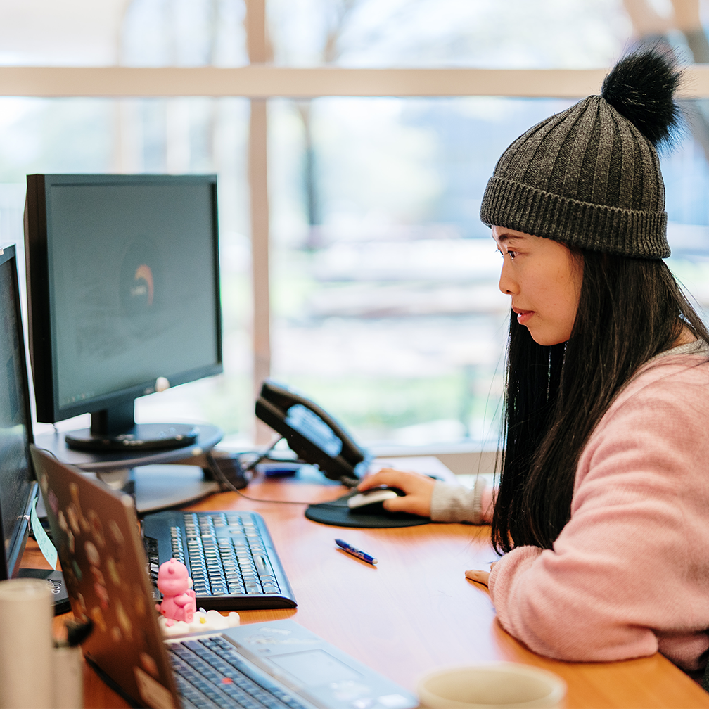 Photo of a person using a computer